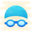 A head wearing a swimcap and goggles